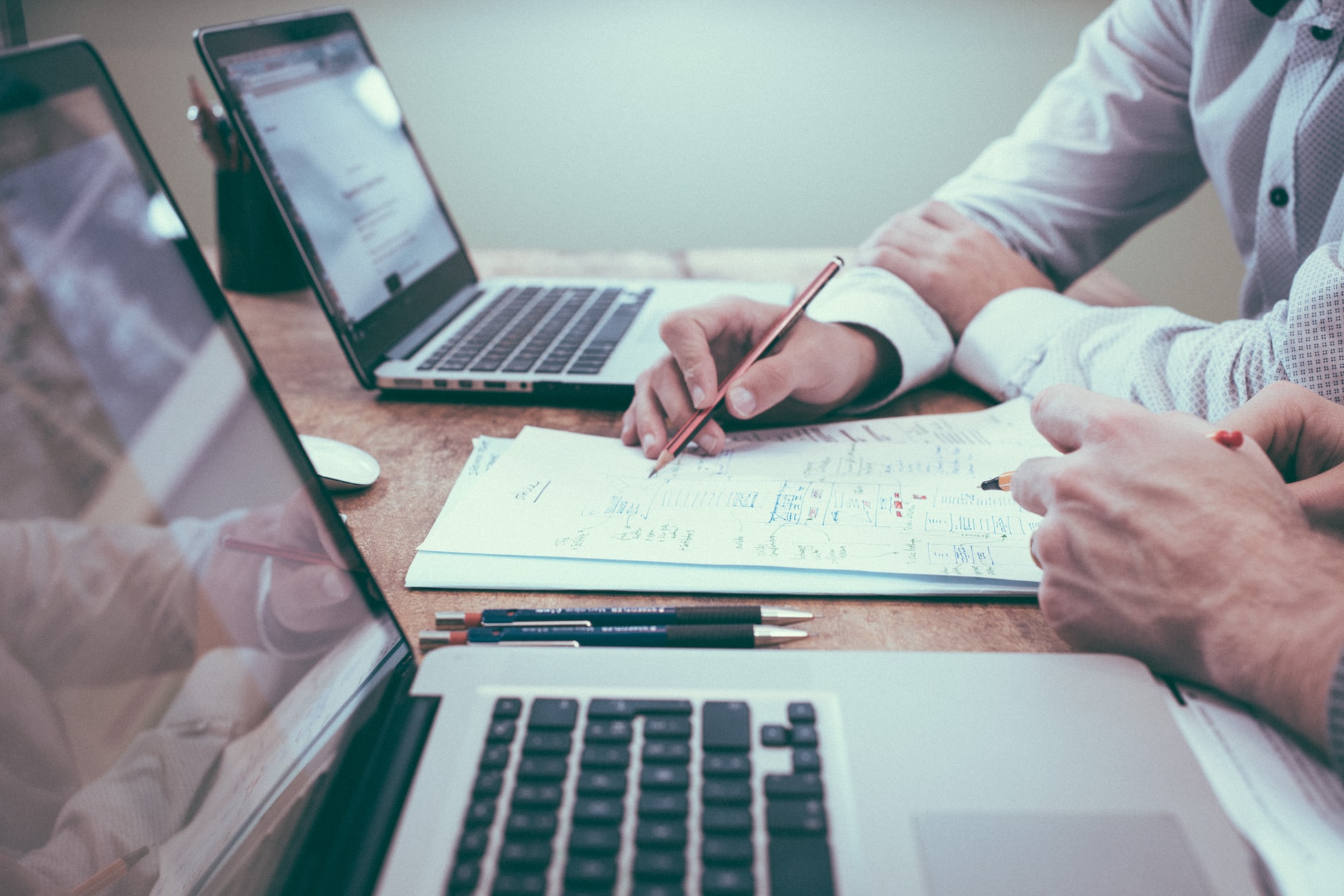 An Ailon mortgage consultant goes over a client file